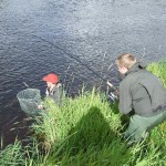 James playing a salmon, Chris with net, Wall Pool, Mount Falcon, River Moy.